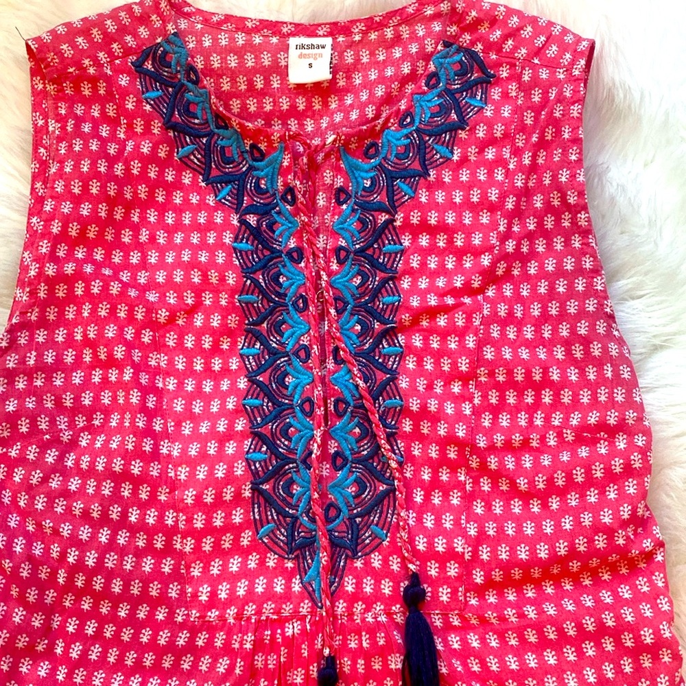 Pink block print with blue embroidery sleeveless top.